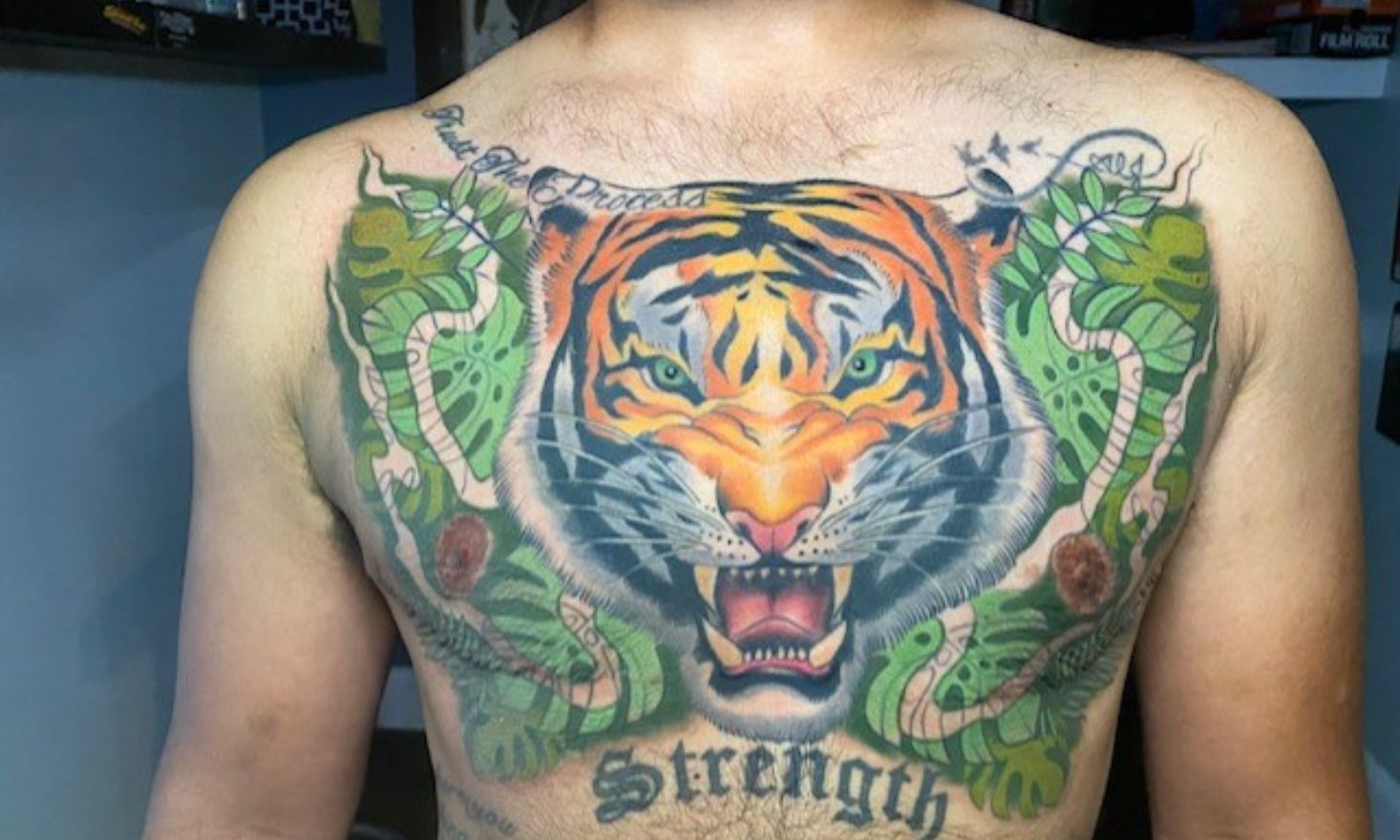 image of person with large tiger tattoo